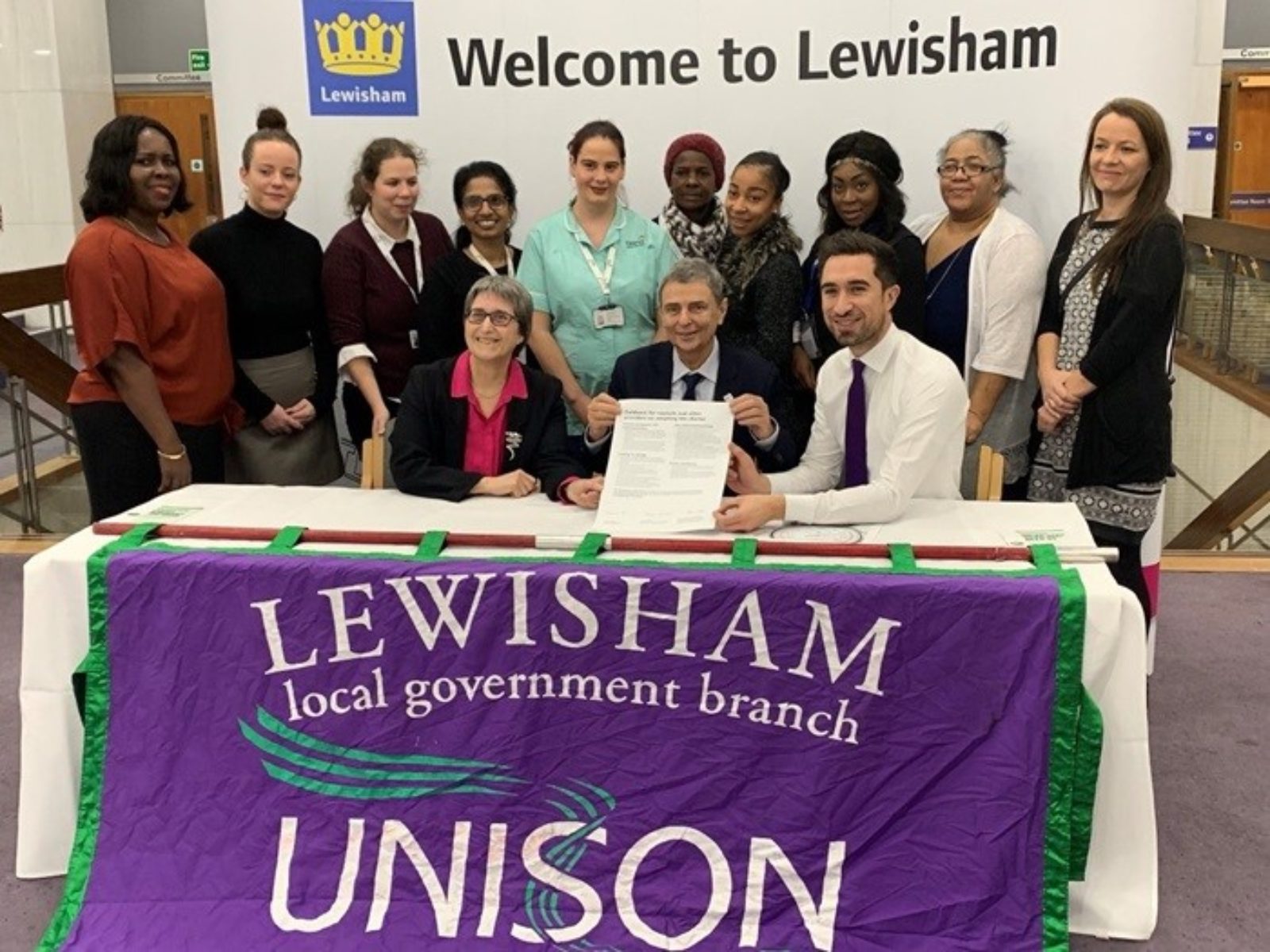 Mayor Damien Egan and Cllr Chris Best, Deputy Mayor and Cabinet Member for Health and Adult Social Care, signing the UNISON Ethical Care Charter with Dave Prentis, previous General Secretary of UNISON, in 2018